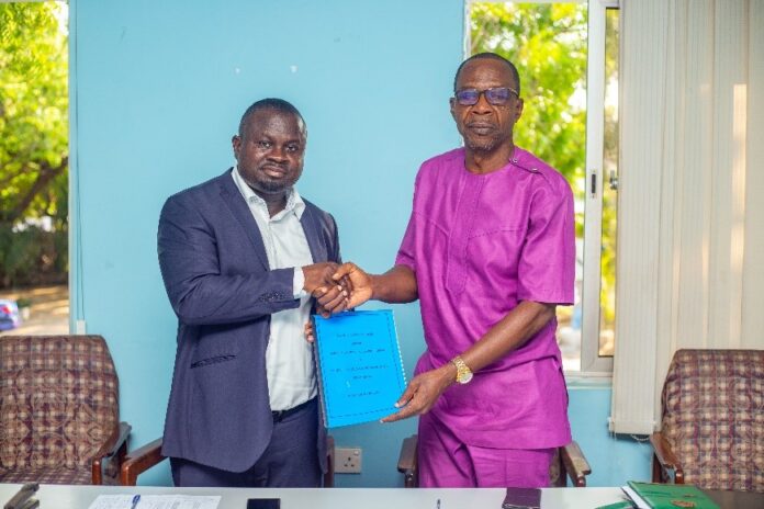 Immediate-past GJA President, Affail Monney (right) presenting his Handing-over Notes to current President, Albert Kwabena Dwumfour (left)