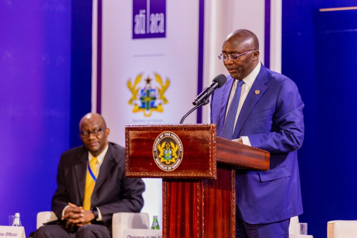 ATI Chief Executive Officer Manuel Moses (seated) with Ghana's Vice President Mahamudu Bawumia at the Company's AGM held June 2022 in Accra, Ghana.