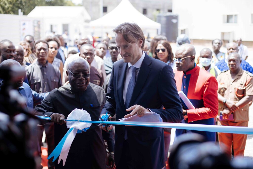 Minister for Environment, Science, Technology and Innovation,  Dr. Kwadwo Afriyie and Danone AMEA President Christian Stammkoetter, cutting the ribbon to commission the Waste Water Treatment plant