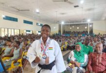 Evelyn Dzato Presents African Championship Gold Medal To AGIS