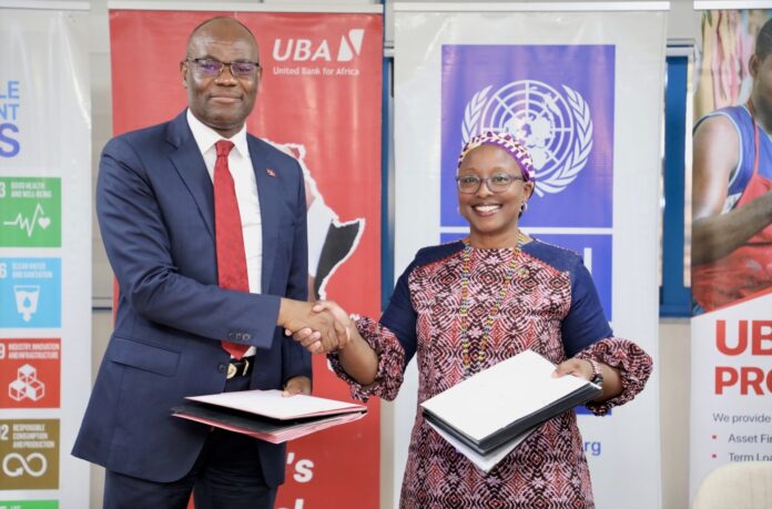 Chris Ofikilu, RCEO UBA West Africa and MD UBA Ghana in a photograph with Dr. Angela Lusigi, UNDP Resident Representative in Ghana exchanging MoU after signing ceremony