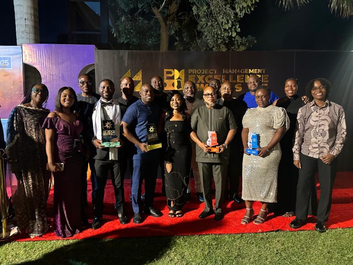 MTN Team in a group picture with the awards