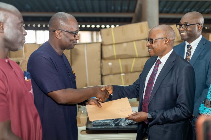 President of the Africa West Area of the Church, Elder Alfred Kyungu, right, handing over the medical equipment to Komfo Anokye Teaching Hospital President of the Africa West Area of the Church, Elder Alfred Kyungu, right, handing over the medical equipment to Komfo Anokye Teaching Hospital