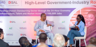 Mr. Augustus Goosie Tanoh, Presidential Advisor to the 24-Hour Economy Authority engaging in a Q&A session at the BOSAG High Level Government Industry Roundtable event