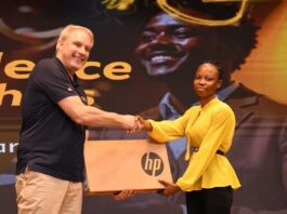 30 Years Of Brightening Lives: 500 Brilliant But Needy Students And Teachers To Benefit From MTN Bright Scholarships Stephen Blewett, CEO of MTN Ghana presenting a laptop to one of the beneficiaries