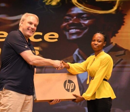 30 Years Of Brightening Lives: 500 Brilliant But Needy Students And Teachers To Benefit From MTN Bright Scholarships Stephen Blewett, CEO of MTN Ghana presenting a laptop to one of the beneficiaries