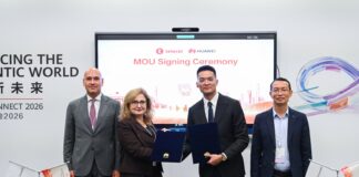 Eleanor Azar, Chief of Staff of Telecel Group, and Chad Wei, Deputy Managing Director of Huawei Ghana, sign the MOU at HUAWEI CONNECT 2026 in Shanghai, witnessed by Nicolas Bourg, Chairman of Telecel Group, and Rex Lei, Regional Vice President of Huawei